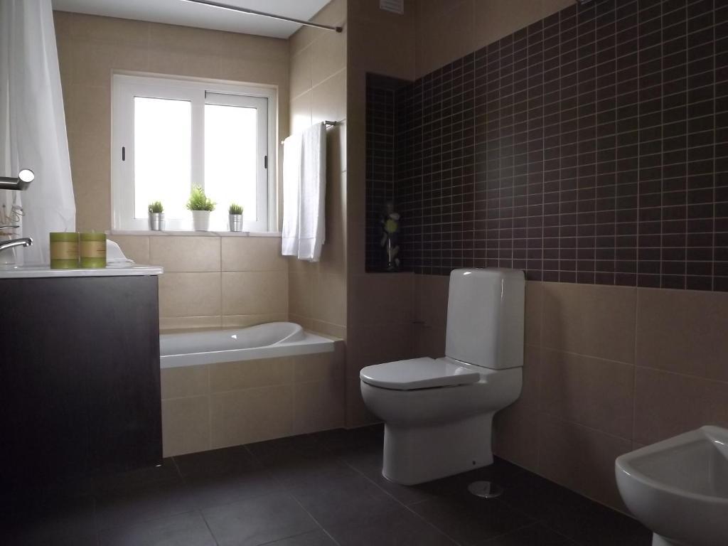 Entrecubos Guesthouse Olhão Rom bilde