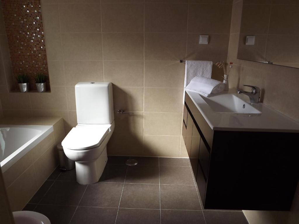 Entrecubos Guesthouse Olhão Rom bilde